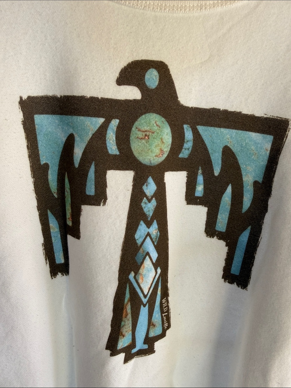 White womens Graphic Tee with Blue Thunderbird Print